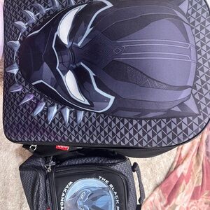 Black panther wakanda book bag and matching lunch box.
